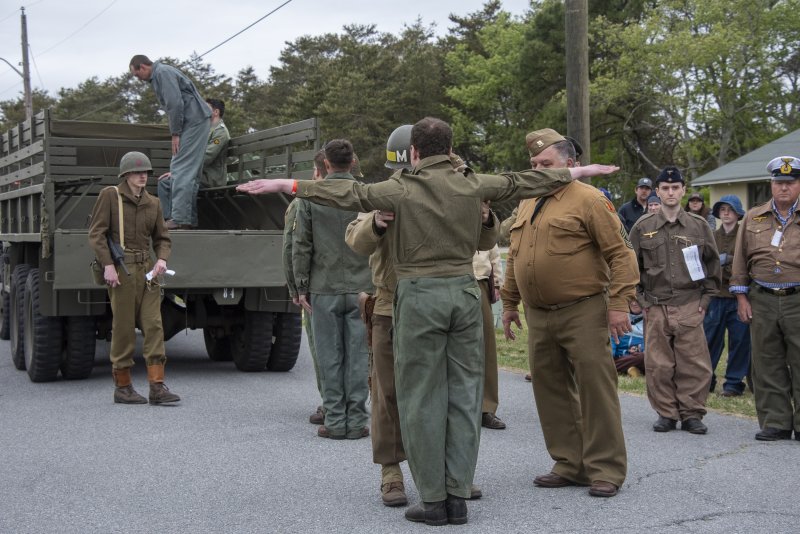 Reenactors portray German submarine soldiers being processed by U.S. soldiers during Fort Miles Defense Day.